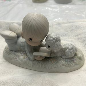 Adorable boy with lamb precious moments